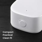 Macro detail of compact rounded white door and window sensor