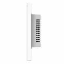 NéoGlass Switch Comfort noir installé au mur pour éclairage ZigBee.