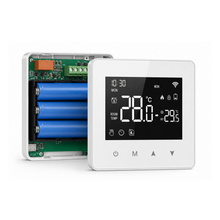 Thermostat NéoAir Essential à piles version Wi-Fi avec compartiment ouvert sur fond studio blanc.