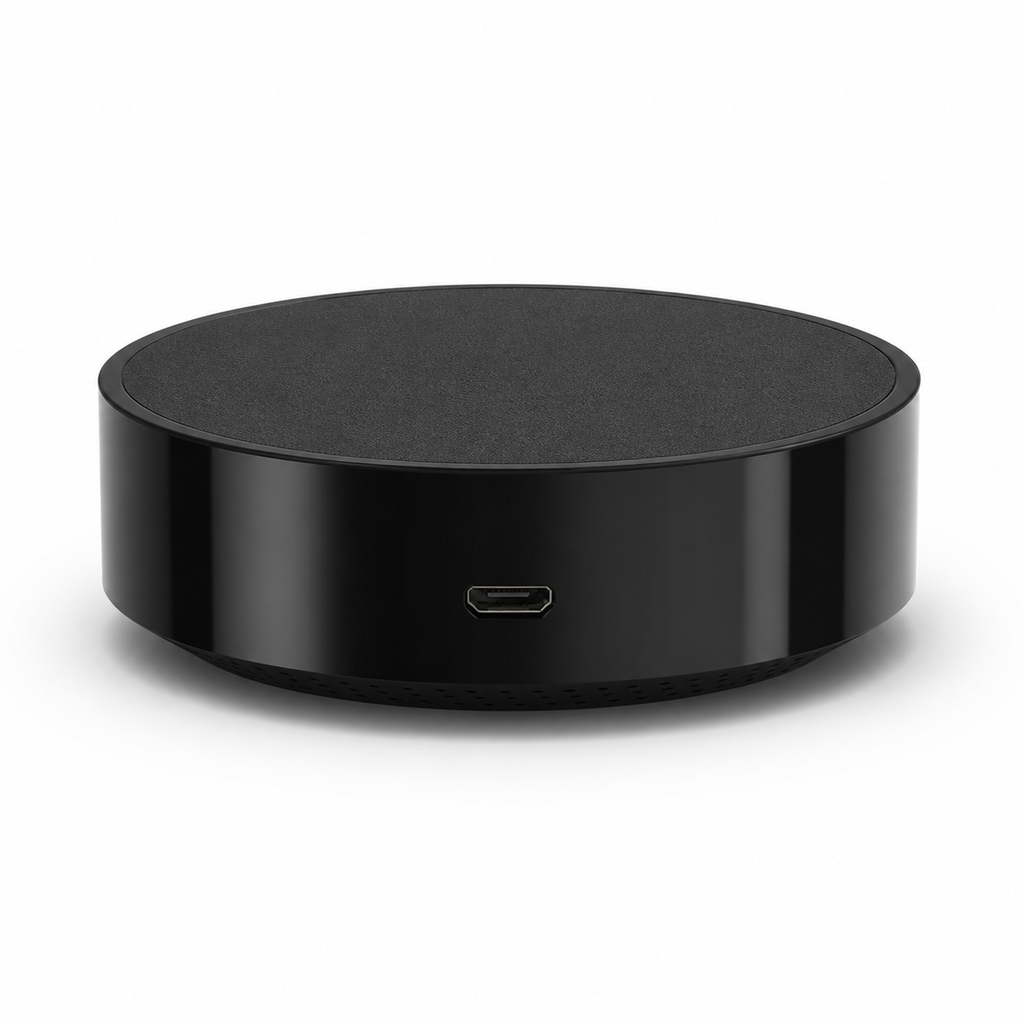 Telecommande IR Wi-Fi noire ronde vue port micro USB sur fond blanc