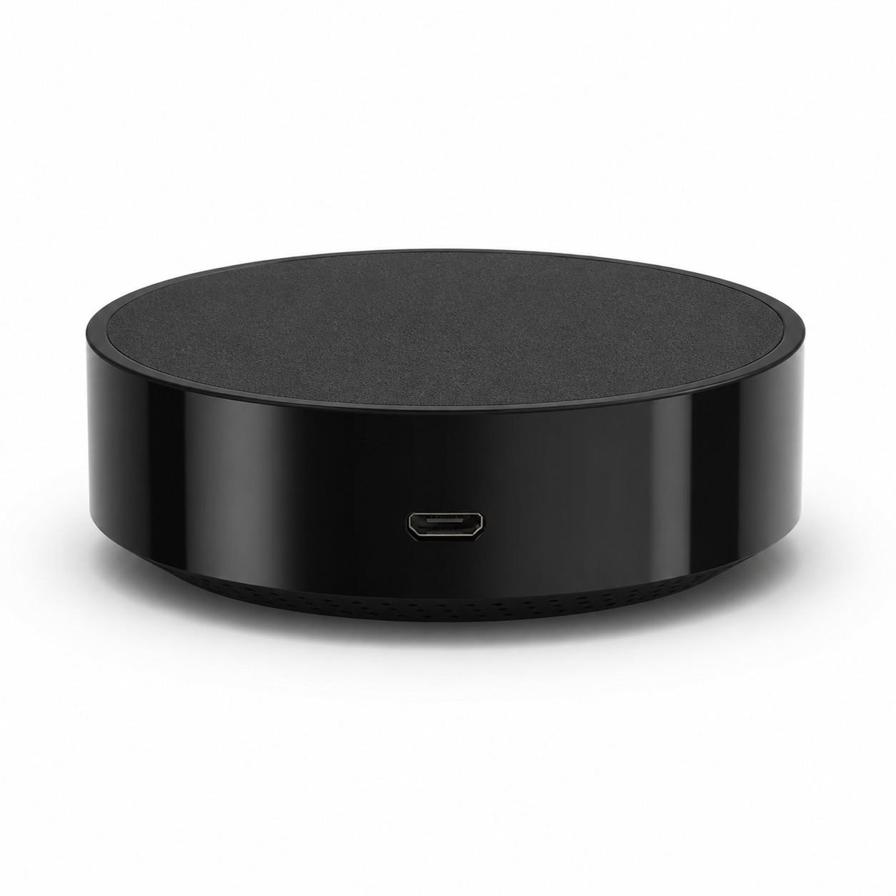 Telecommande IR Wi-Fi noire ronde vue port micro USB sur fond blanc