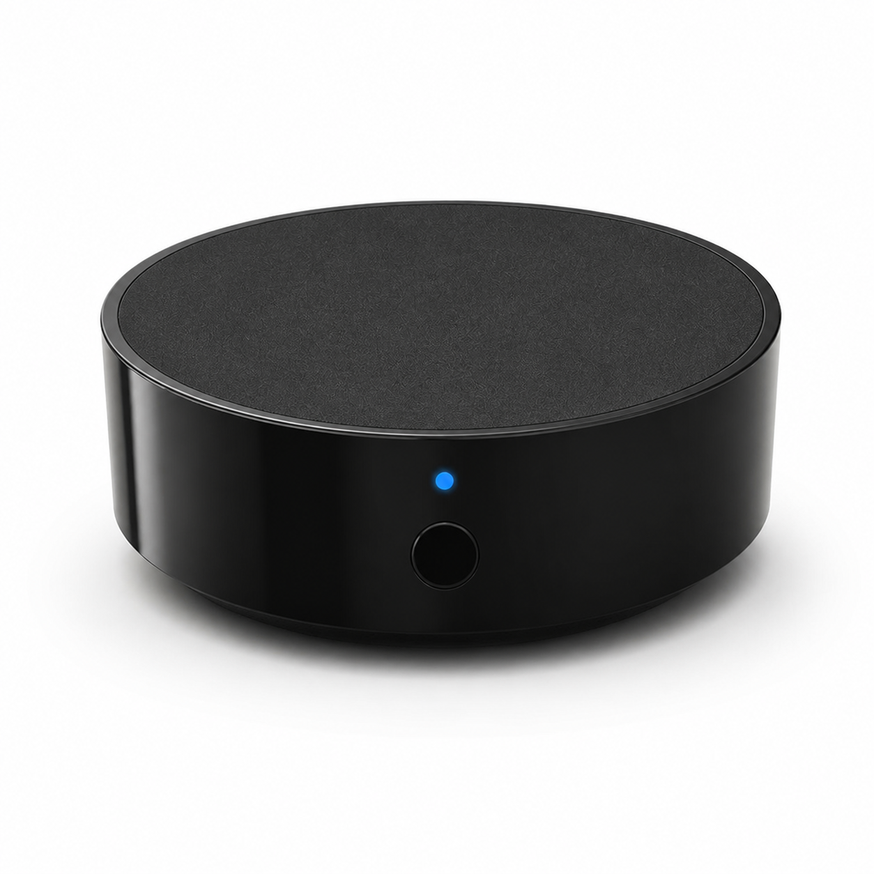Telecommande IR Wi-Fi noire ronde avec LED bleue sur fond blanc