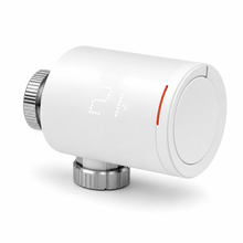 Studio packshot of NéoGraph Comfort thermostatic radiator valve with red indicator