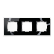 Black three-module NéoGrid Essential wall frame with empty openings