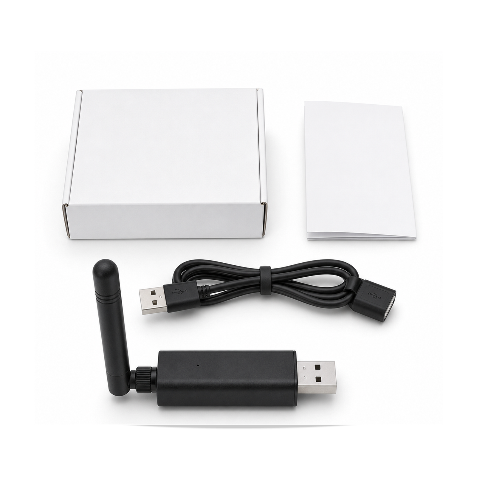 Kit NéoLink Lite Pro avec dongle ZigBee et Thread USB, antenne, câble d’extension, boîte et guide sur fond blanc.
