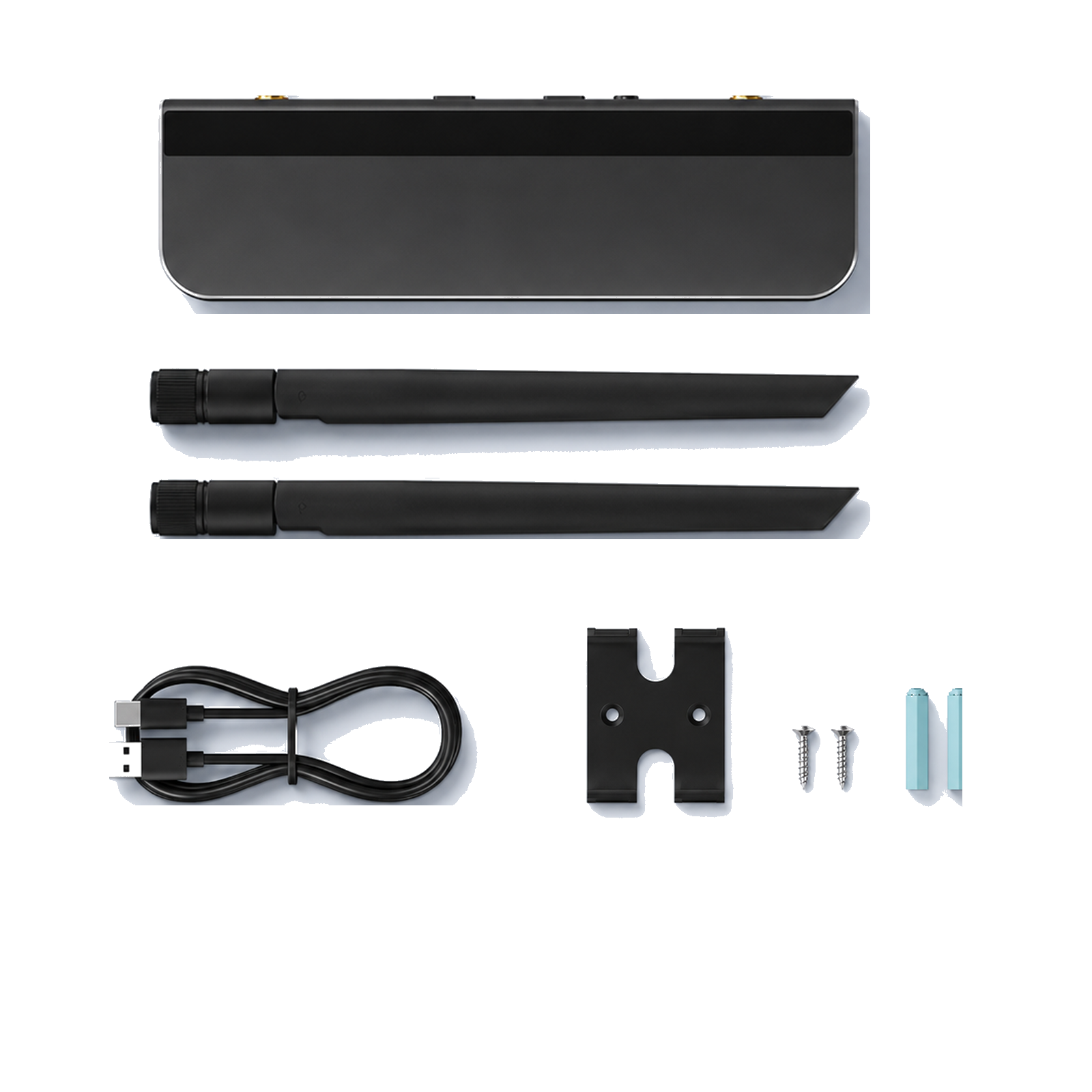Contenu physique de la passerelle NéoLink PoE Essential avec antennes et accessoires sur fond blanc