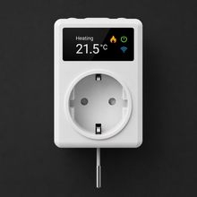 White thermostat smart plug with heating display on dark studio background