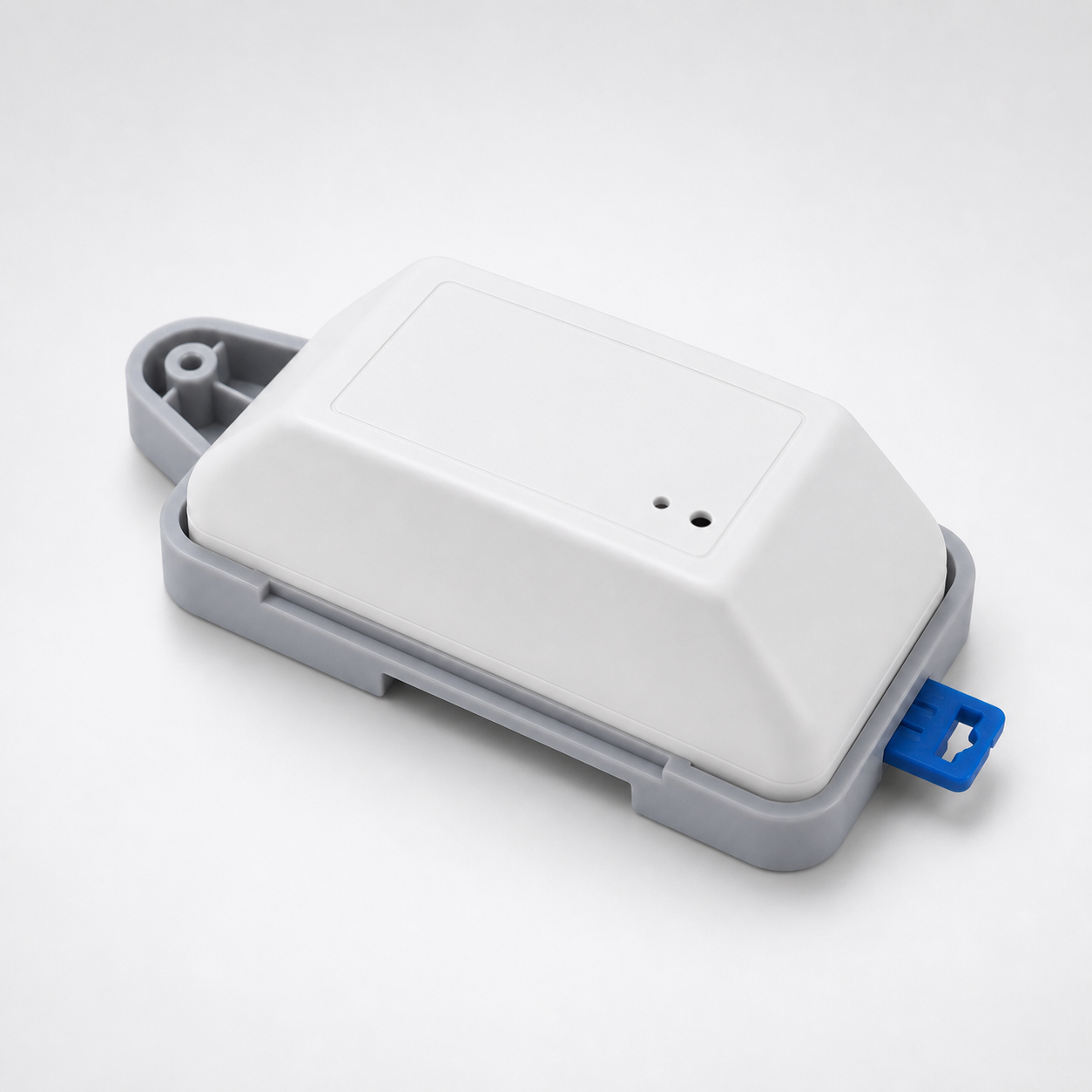 Side angle packshot of rounded smart module on DIN rail tray