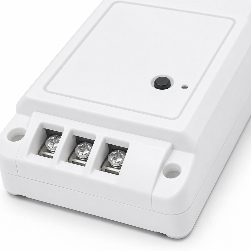 Close-up of relay module terminals and pairing button