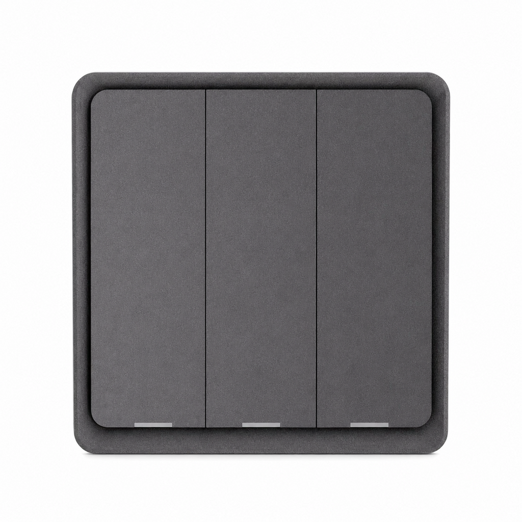 Studio packshot of black three-gang magnetic scene switch