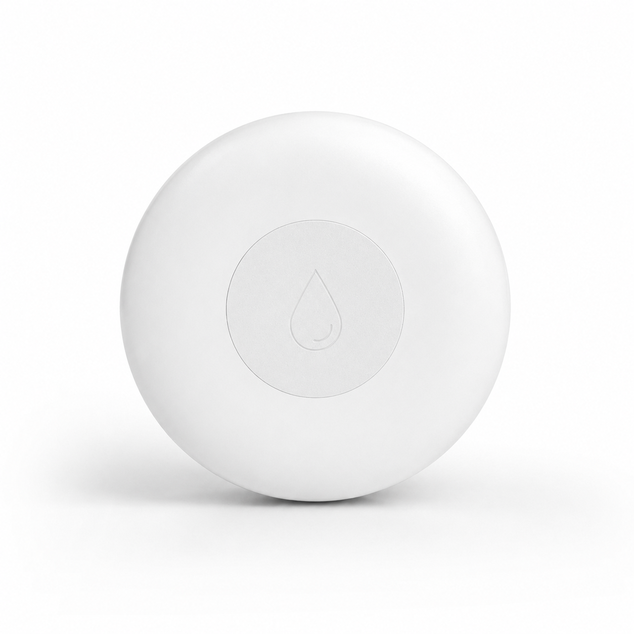 Studio packshot of compact ZigBee water leak detector on white background