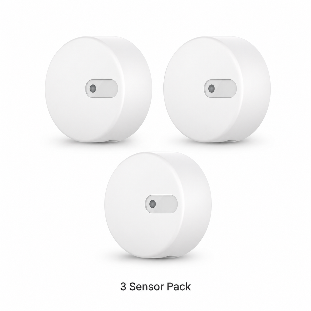 Studio packshot of three radar presence sensors
