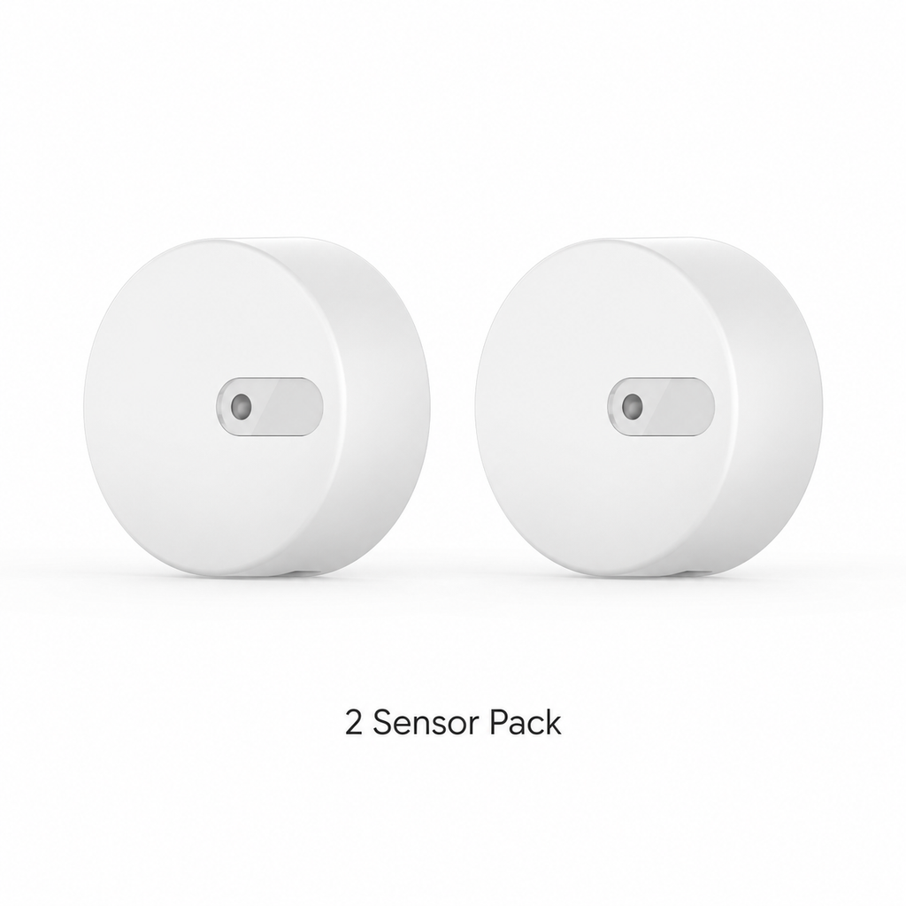 Studio packshot of two radar presence sensors