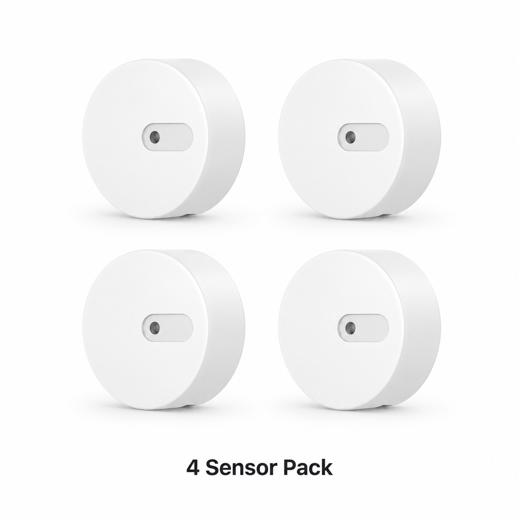 Studio packshot of four radar presence sensors