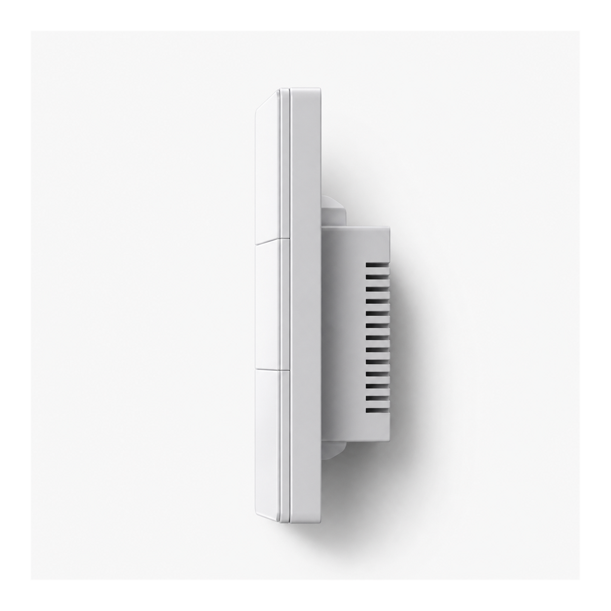 Profil mince de l'interrupteur NeoSoft Essential avec module arriere sur fond studio blanc.
