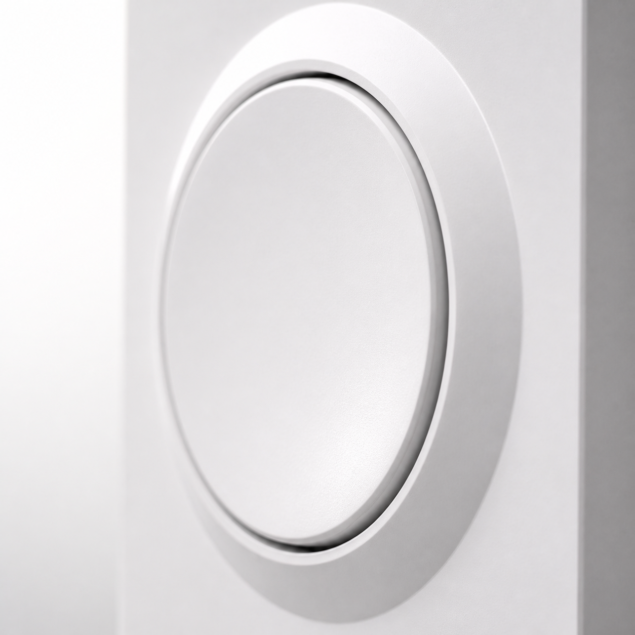 Close-up detail of the raised round button on NéoSwitch Orb-Matter Pro