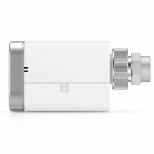 Side profile studio image of a smart thermostatic radiator valve with mounting ring