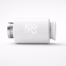 Vanne thermostatique Zigbee NéoValve Essential Classic vue horizontale sur fond blanc studio.