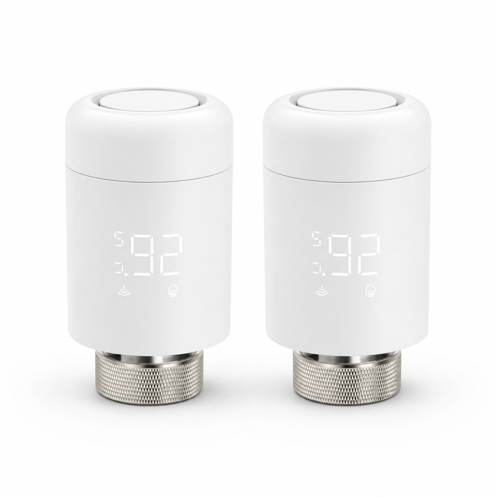 Pack of two WiFi smart thermostatic radiator valves on a white studio background