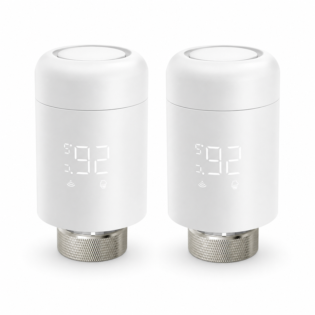 Pack of two ZigBee smart thermostatic radiator valves on a white studio background