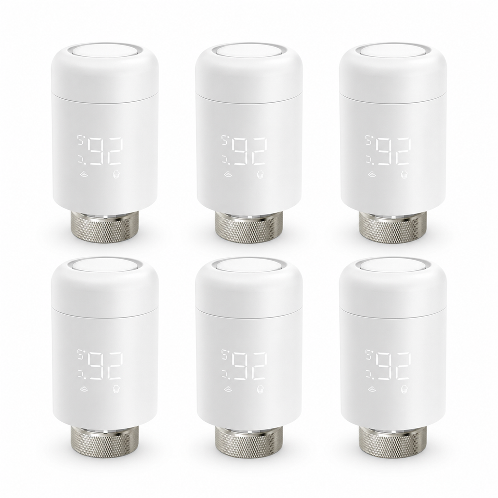 Pack of six ZigBee smart thermostatic radiator valves on a white studio background