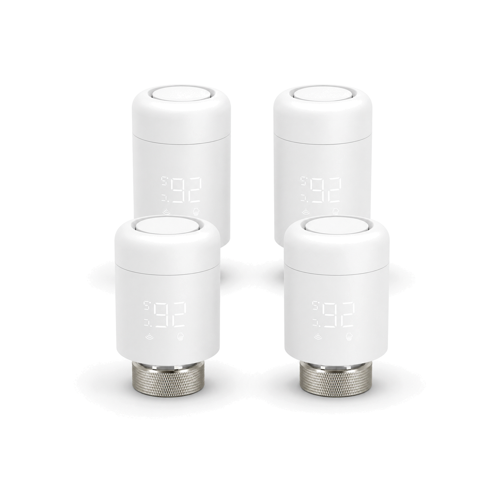 Lot de quatre vannes thermostatiques Wi-Fi NéoValve Pack Essential sur fond blanc