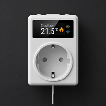 Prise thermostat avec écran chauffage à 21,5 degrés sur fond sombre.