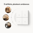 NéoScene 4 Comfort, télécommande de scénarios Zigbee installée au mur dans un salon moderne.