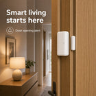 ZigBee door opening sensor installed on a modern interior door frame