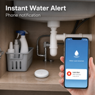 Under sink water leak alert scene with mobile notification