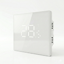 Thermostat mural blanc avec affichage LED en vue inclinée.