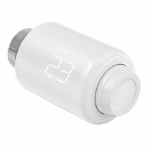 Vanne thermostatique NéoForce Comfort blanc pur vue en angle avec écran LED et molette crantée.