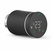 Vanne thermostatique NéoSoft Curve Comfort noir absolu avec écran LED affichant 23,5 °C et bague métallique.