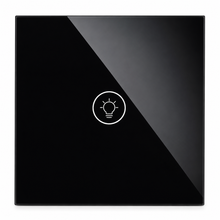 Gros plan du NéoMulti Dimmer noir brillant avec icône ampoule au centre de la façade tactile.