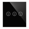 NéoMulti Dimmer noir brillant avec trois touches tactiles lumineuses pour trois zones d'éclairage.